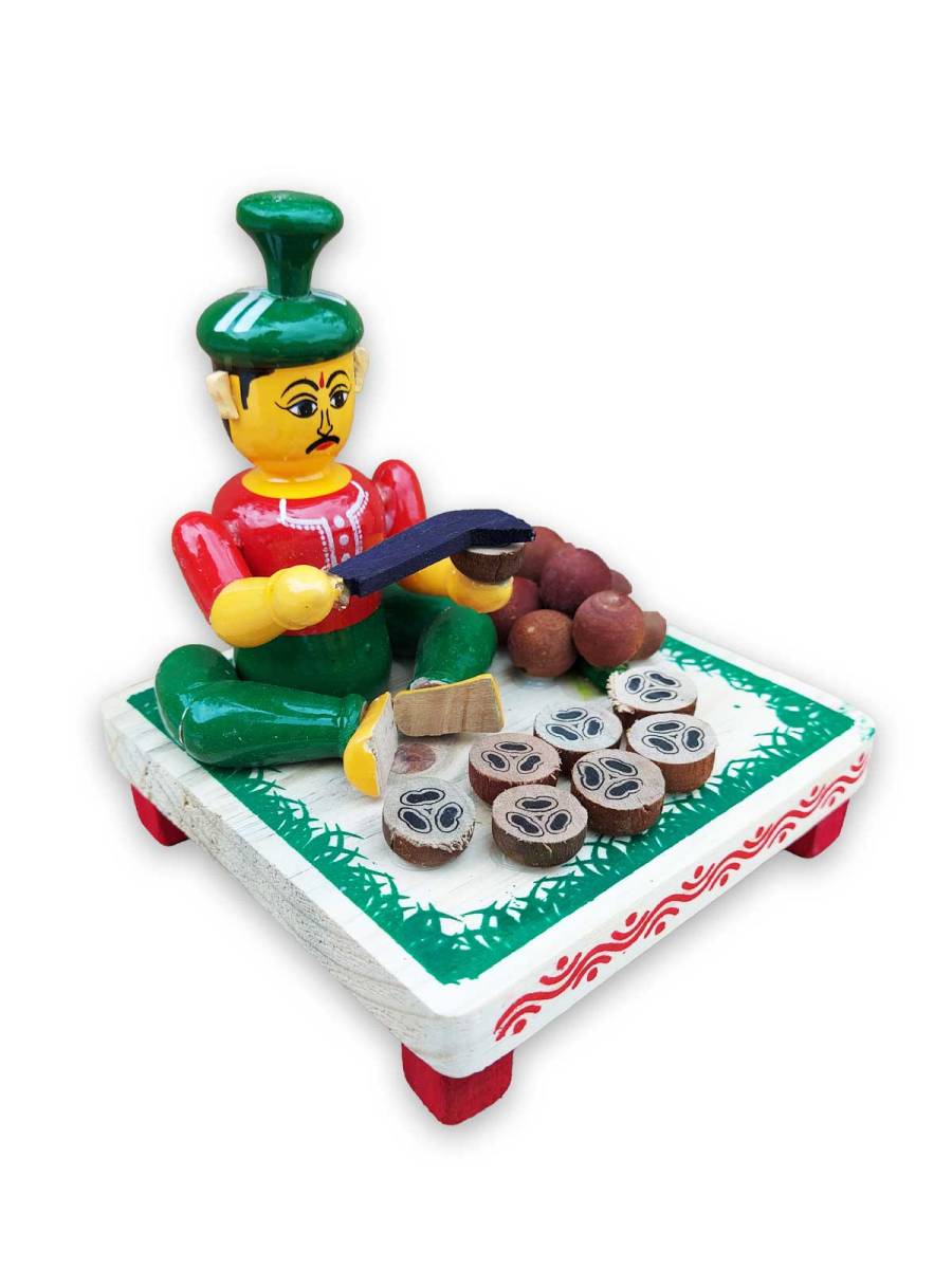 Wooden Village Man Selling Coconut - Etikoppaka Dolls
